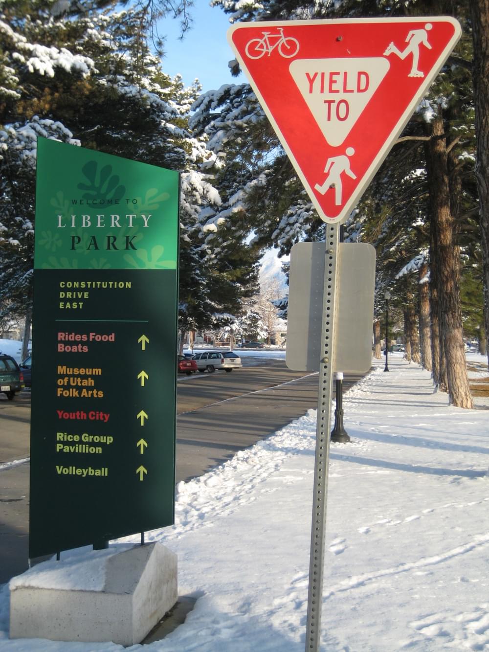 Sign asks bicycles to yield to skaters and runners, Liberty Park Trail; Salt Lake City, Utah