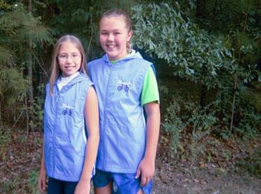 Melissa, left, and Hannah in their Trace Travelers vests 
