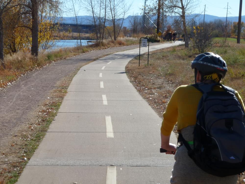Crusher fines trail marked for pedestrians along Mary Carter Greenway by the Platte River, South Suburban Park District, Colorado