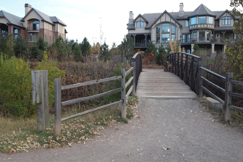 Very expensive homes overlook the Highline Canal Trail in the exclusive Denver suburb of Cherry Hills Village, Colorado