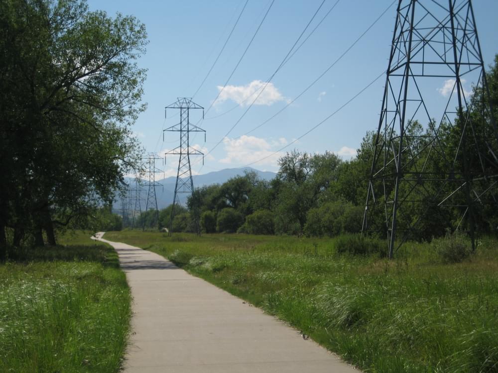 High tension lines and trail through open space along Van Bibber Creek Trail; Jefferson County Open Space, Colorado