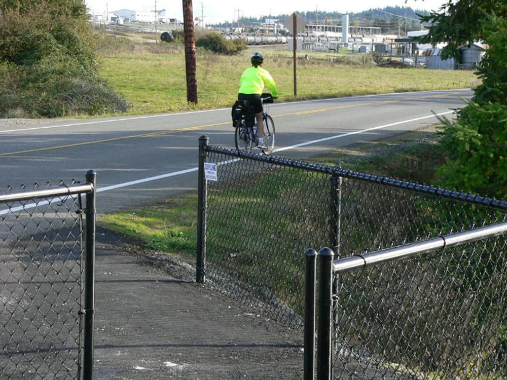 East end Thompson Trail Project, Anacortes, Washington, showing fencing to alert riders as the trail ends at a highway 