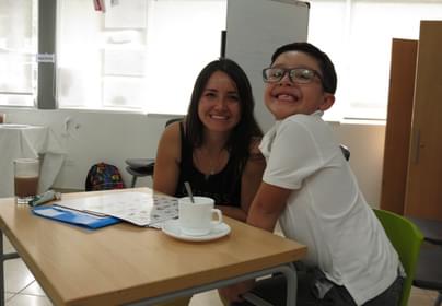 happy mother and son at classes in bsq