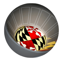A soft light shines through the reds, gold, black and white colors of the Maryland flag in a circular stain glass window
