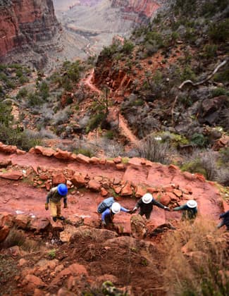 Crew members from the American Conservation Experience working on cyclical trail maintenance. Photo by Jessica Plance.