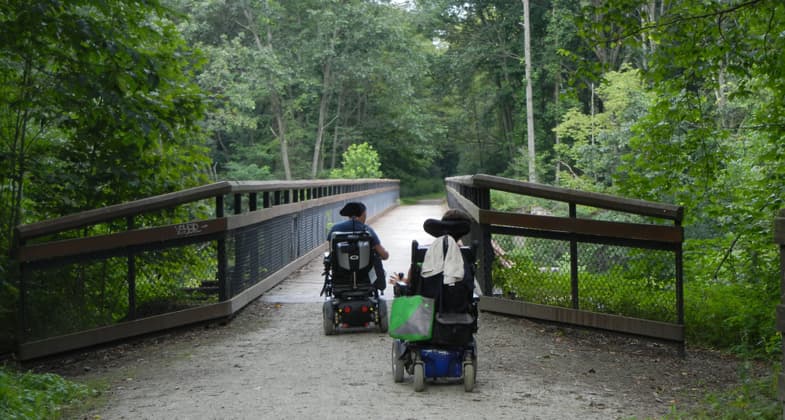 A 2% grade makes the trail accessible to these 4-wheelers. Photo by Robert Kauffman.