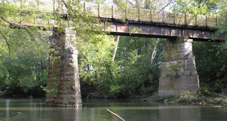The Frisco Highline Trail crosses 16 railroad bridges, including this 1880's beauty on the Little Sac River, at mile marker 23.
