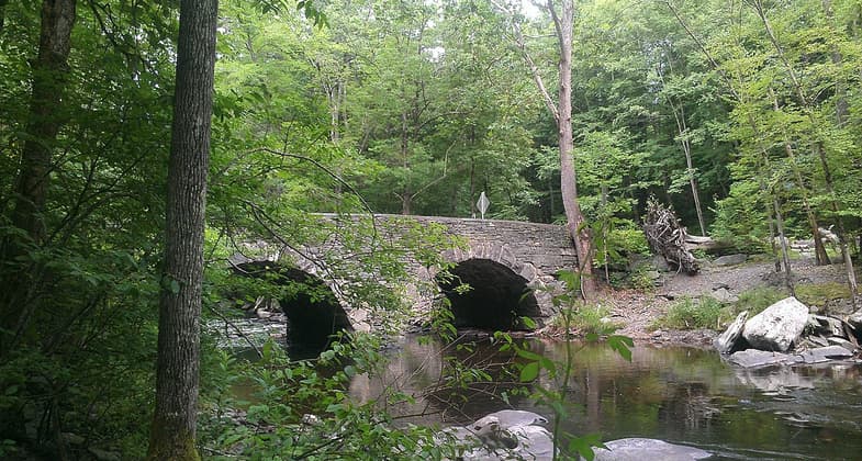 Bridge over the Ten Mile River. Photo by Charles Fulton wiki.