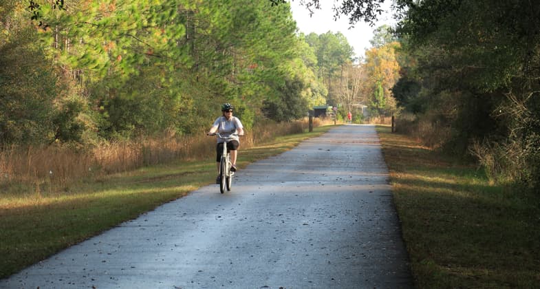 Rider on Blackwater Heritage State Trail. Photo by Doug Alderson.