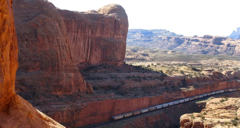 A train carrying potash can be seen from the base of Corona Arch. Photo by Valerie A. Russo.