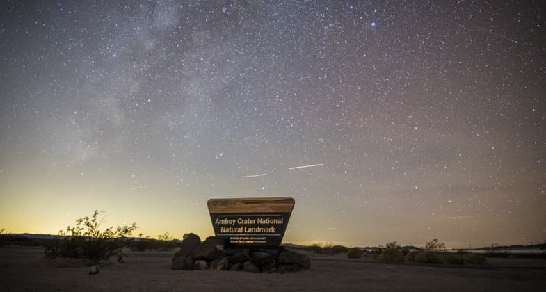 Photo by Kyle Sullivan. The night sky is immense and the milky way appears almost 3D at Amboy Crater.