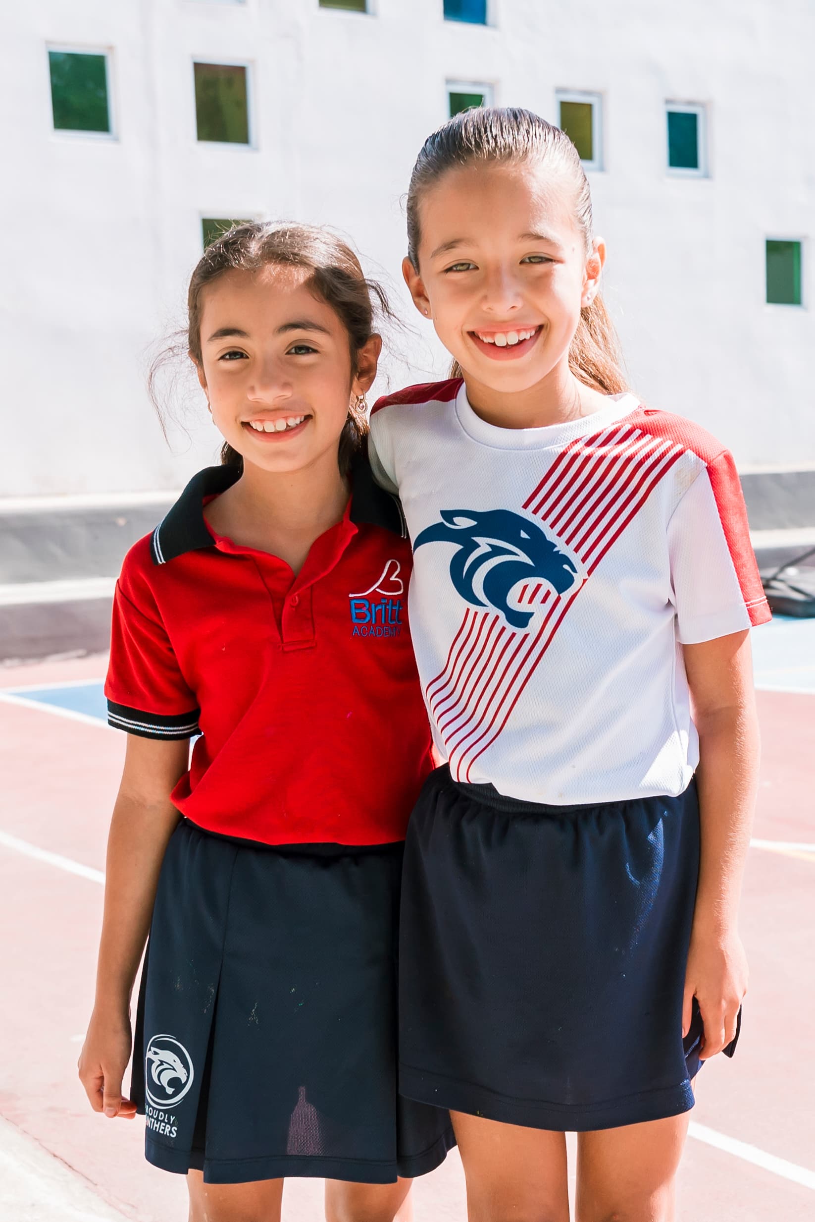 Two happy friends at school