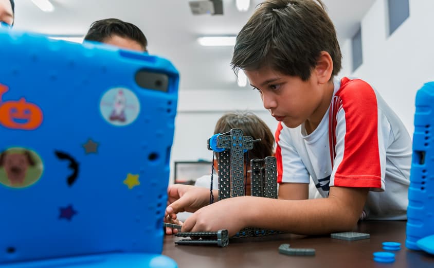 Young Student Studying Robotics