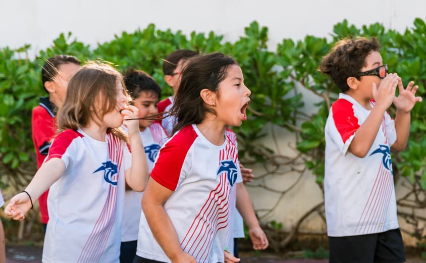 Kids playing sports at school