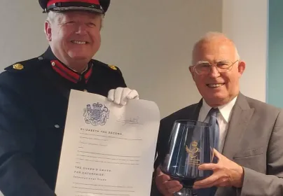 Kevin Mc Neany accepted the Queens Award