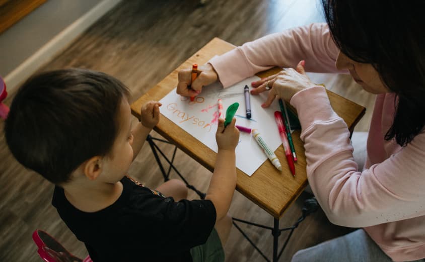 Teacher and Student at a table