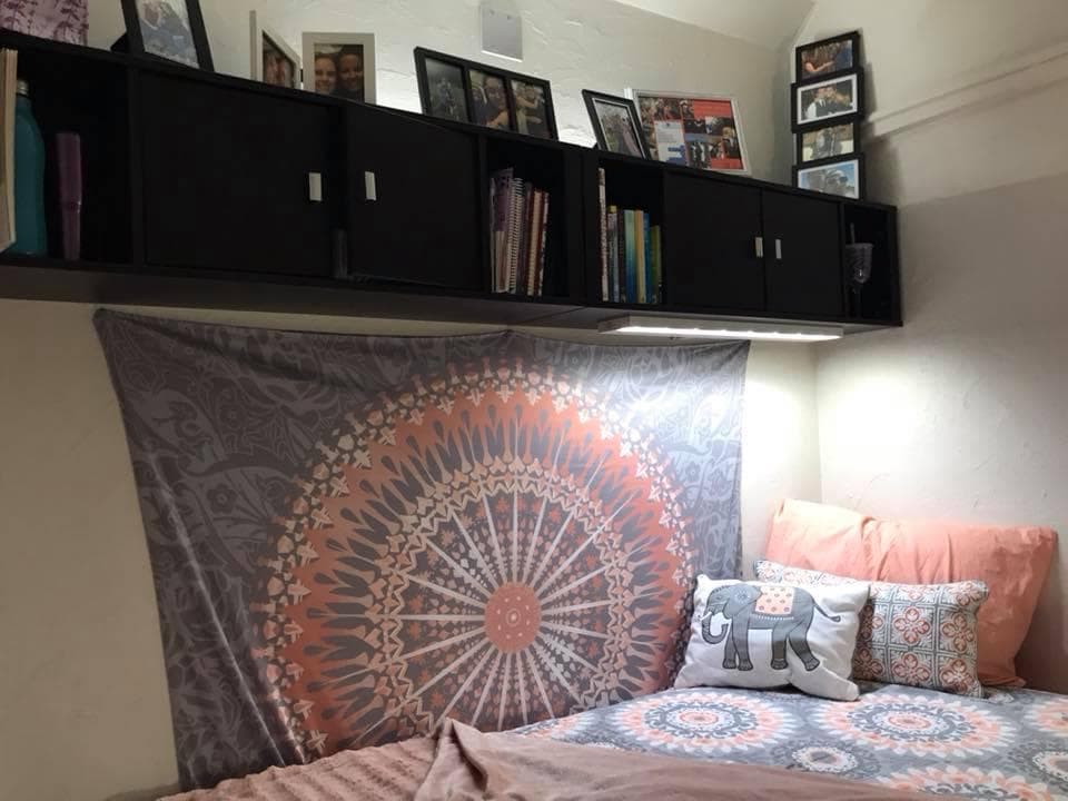 Erin's room is filled with pictures of friends and loved ones. Erin's room is filled with pictures of friends and loved ones.