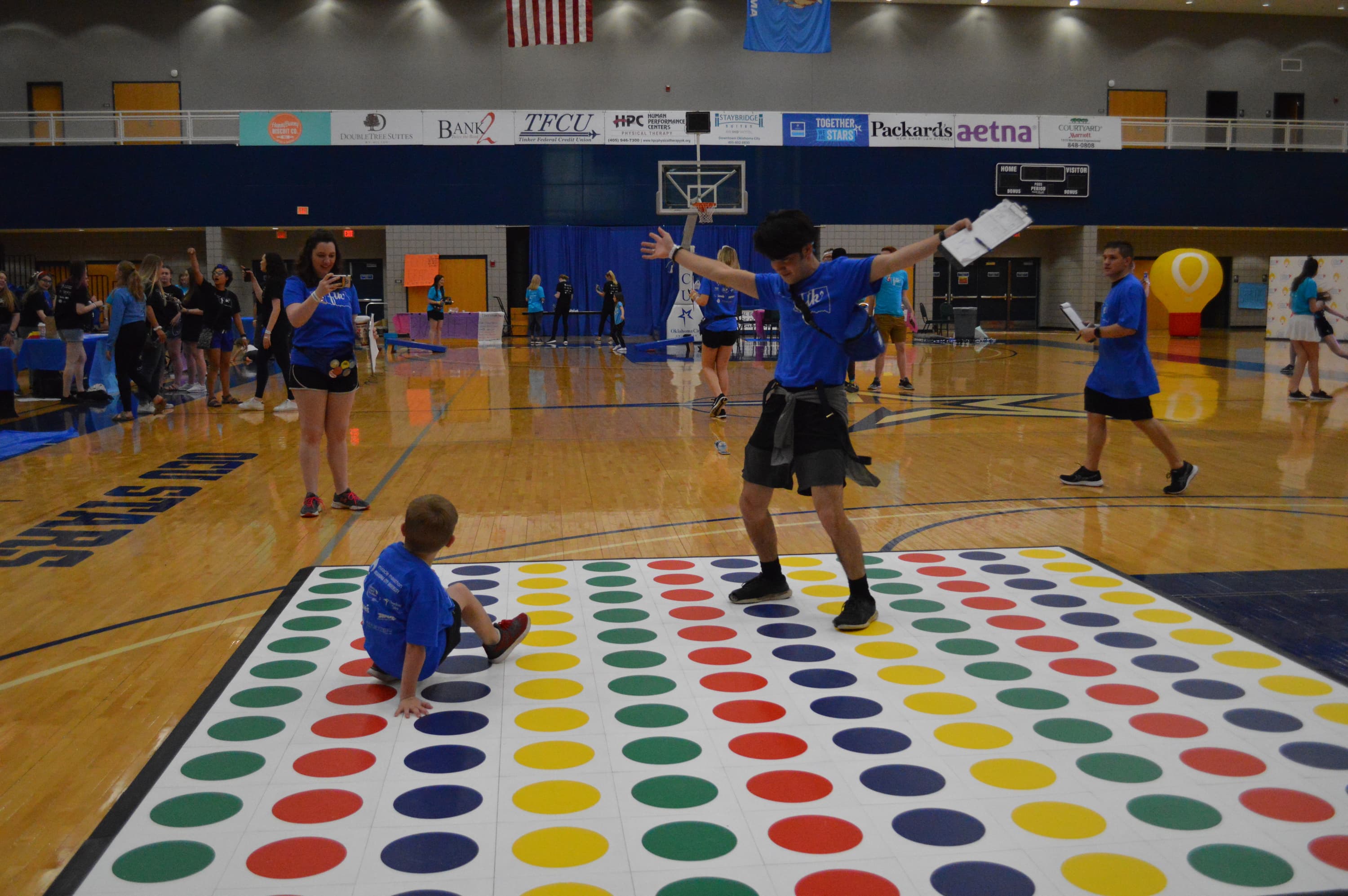 A giant Twister game entertained children and adults at the Miracle Marathon