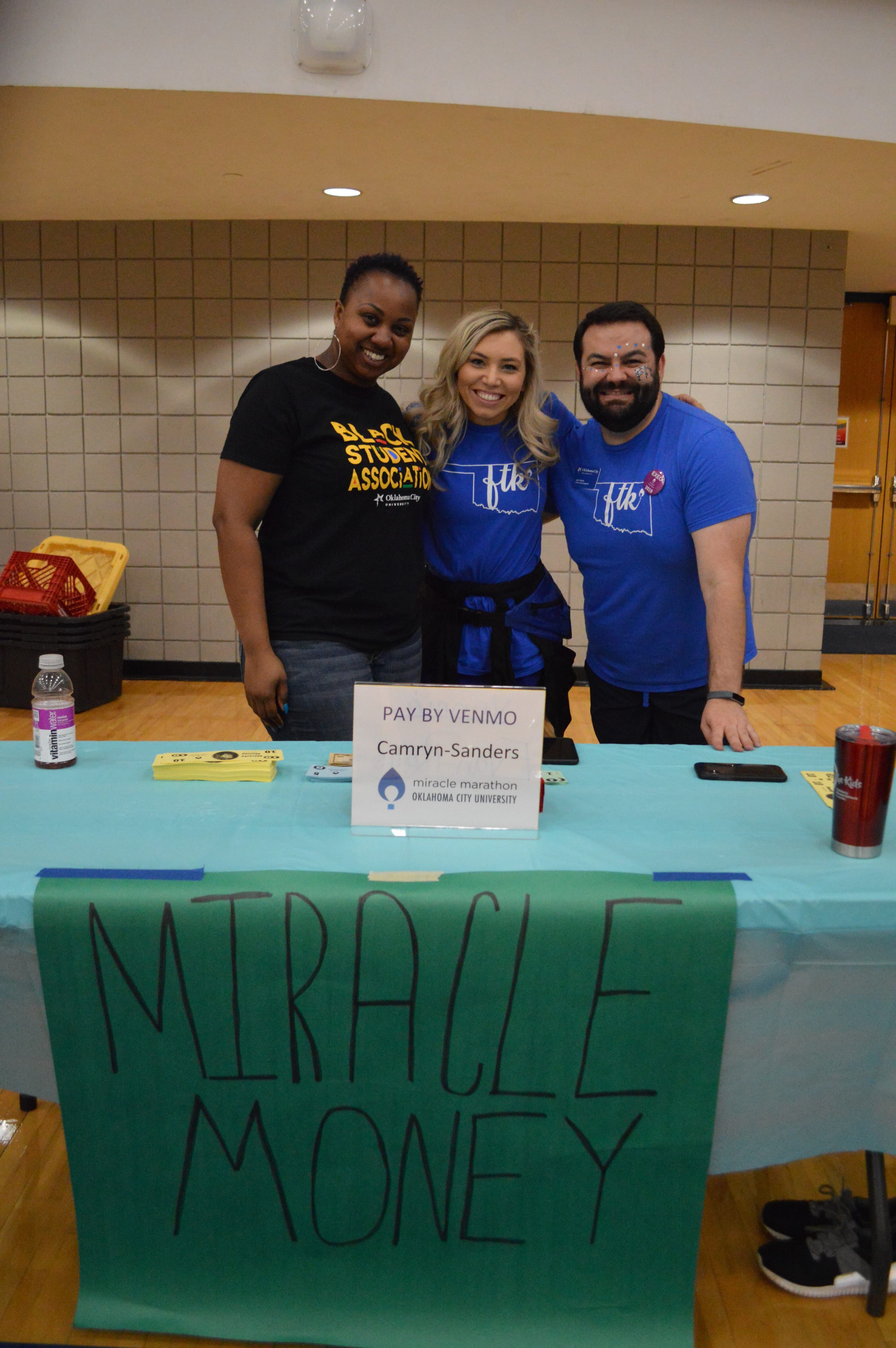 Kanika Brown, Haley Stiles and Levi Harrel raising money at the Miracle Marathon