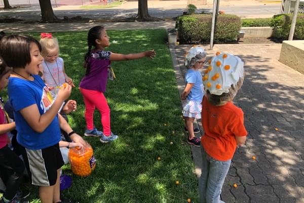 Project Transformation campers competing to see who can make the most cheese balls stick. Project Transformation campers competing to see who can make the most cheese balls stick.