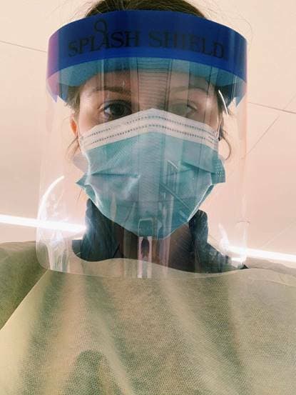 Regan McQuaid at work in protective medical gear Regan McQuaid at work in protective medical gear