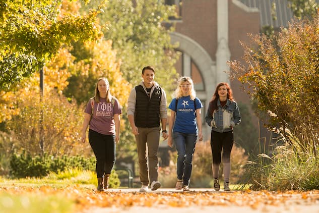Students walk across the OCU campus