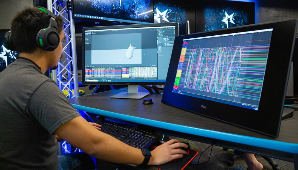 A student animates a digital character in OCU's game design and animation lab.