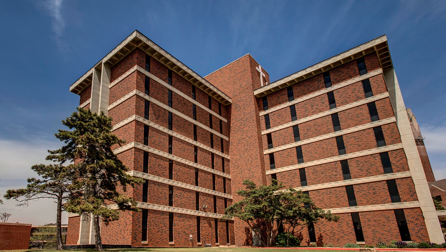 Walker Hall, a seven-story brick freshman dormitory on OCU's Campus