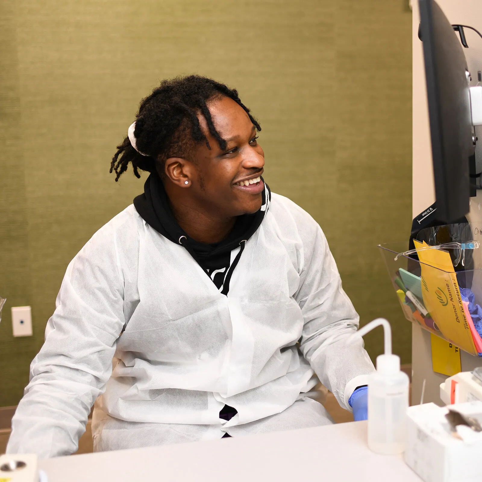 Olgam Life blood plasma technician