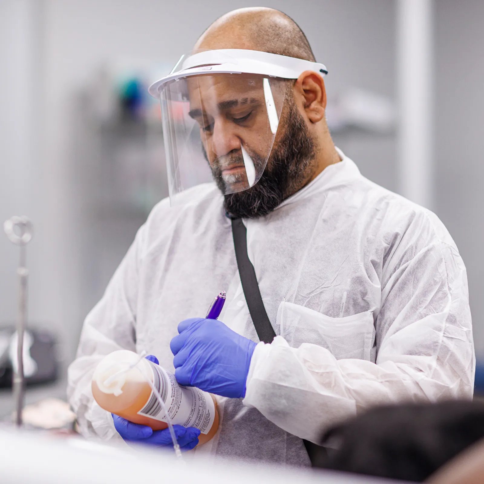 Olgam Life blood plasma technician