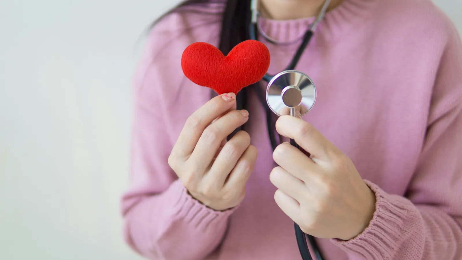 Woman holding heart