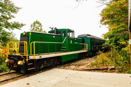 green train on tracks
