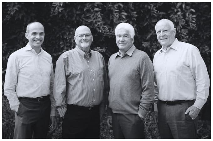 On Tap Consulting founders: Andre Neumann-Loreck, Jim Booth, Pierre Patkay, and Fred Forsyth