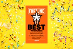 Image of the Fortune Best Workplaces in Consulting & Professional Services logo on top of a confetti background.