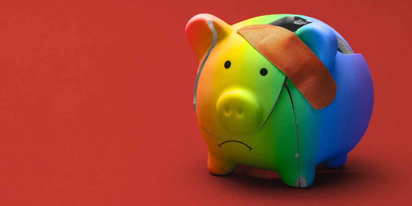 A cracked, rainbow-colored piggy bank is held together with a bandage, and the piggy bank's mouth is frowning. The background is solid red.
