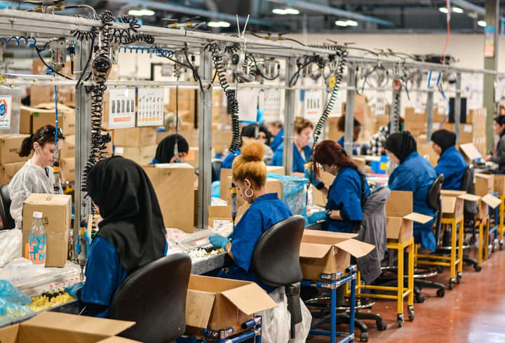 Women working on SodaSteam devices at the SodaStream factory in Israel. Shot during press trip to SodaStream factory in 2019. Photo by Remy Gieling via Unsplash.