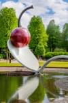 Image of Spoonbridge and Cherry, a sculpture of a large bent spoon with a cherry in the tip of the spoon located in the Minneapolis Sculpture Garden in Minneapolis, Minnesota