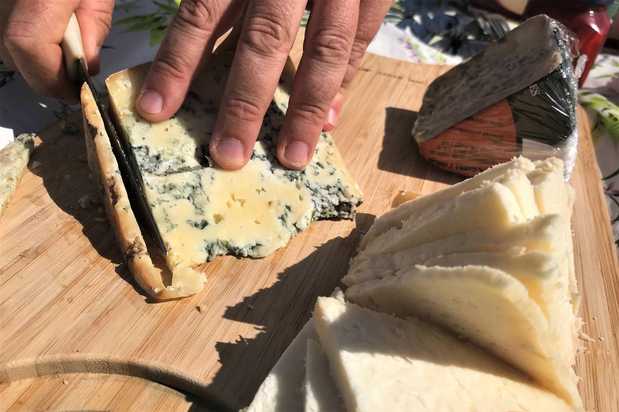Spain picos de europa cheese cutting various cheeses close up