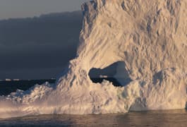 Antarctica drake south shetland iceberg hole sunset c diego