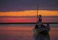 Argentina ibera hotel puerto valle boat ride at sunset