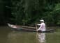 Nicaragua rio san juan lady paddling canoe along river