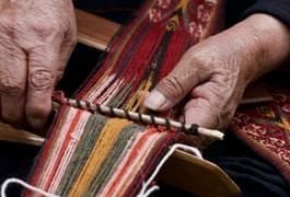 Peru sacred valley chinchero weavers hands
