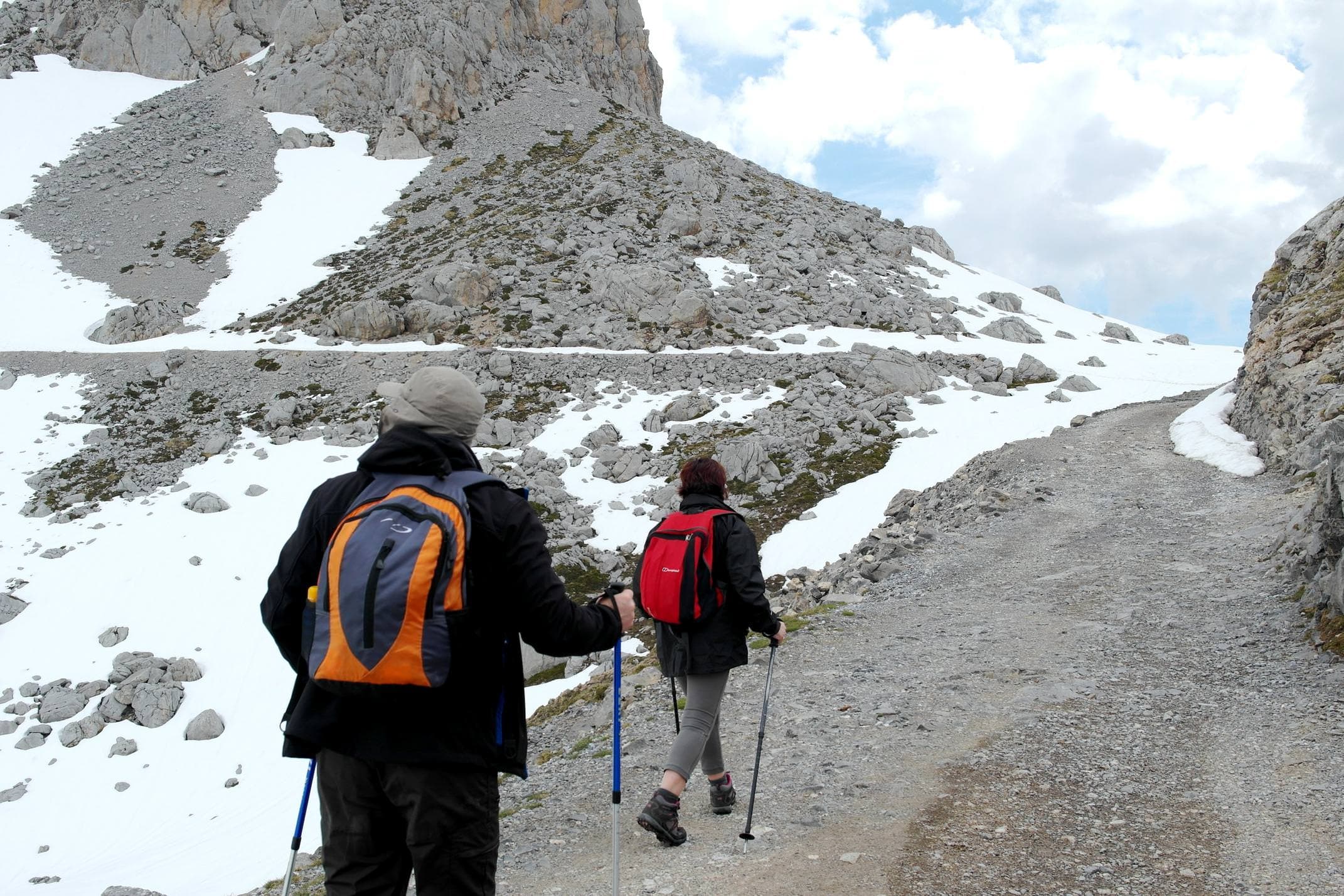 Spain picos de europa walking couple on path fuente de