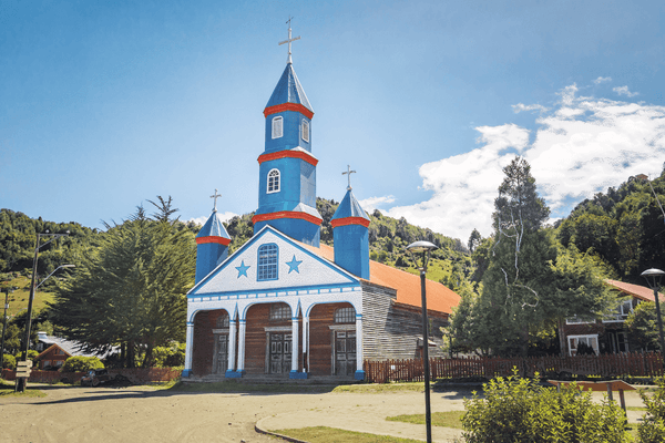 Chile chiloe colourful wooden church c canva w1500autocompress2 Cformatfitcropdm1649143045s1f89348ef8464e5f24934480d933ea2f