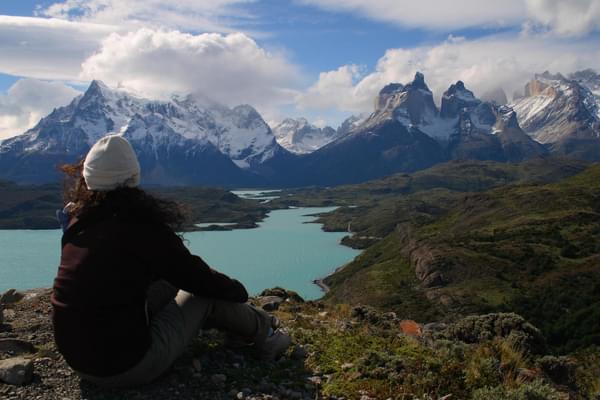 Chile patagonia torres del paine patagonia camp girl sitting view over massif