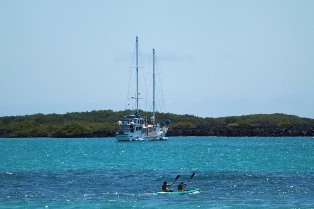Ecuador galapagos islands sea kayaks behind cachalote yacht20180829 76980 1ta010b