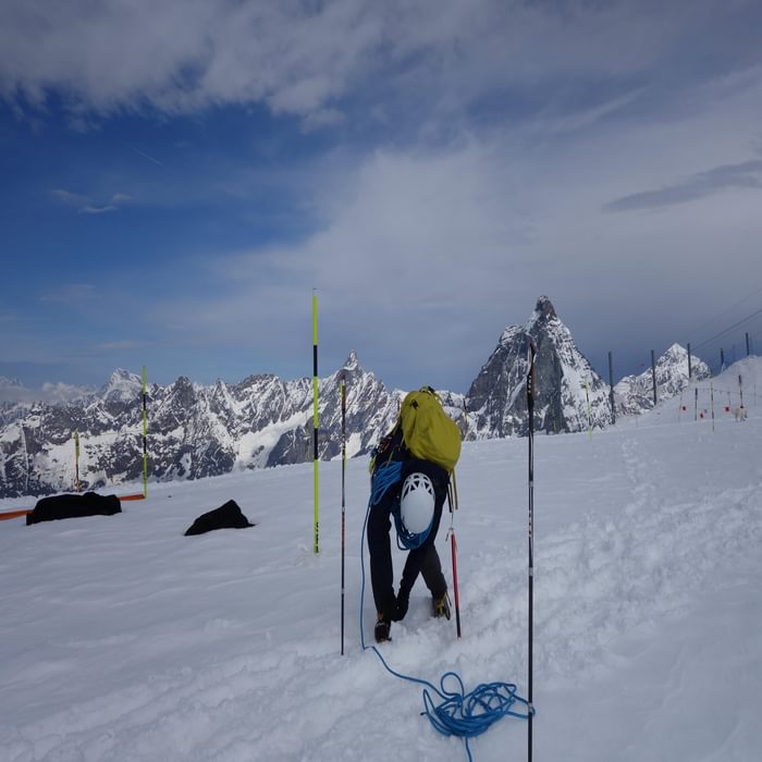 Putting on crampons outside the only useful lift that was functioning: Klein Matterhorn. Three fourthousanders dominate the background