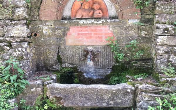 Water fountain and shrine near the village of Ferrano