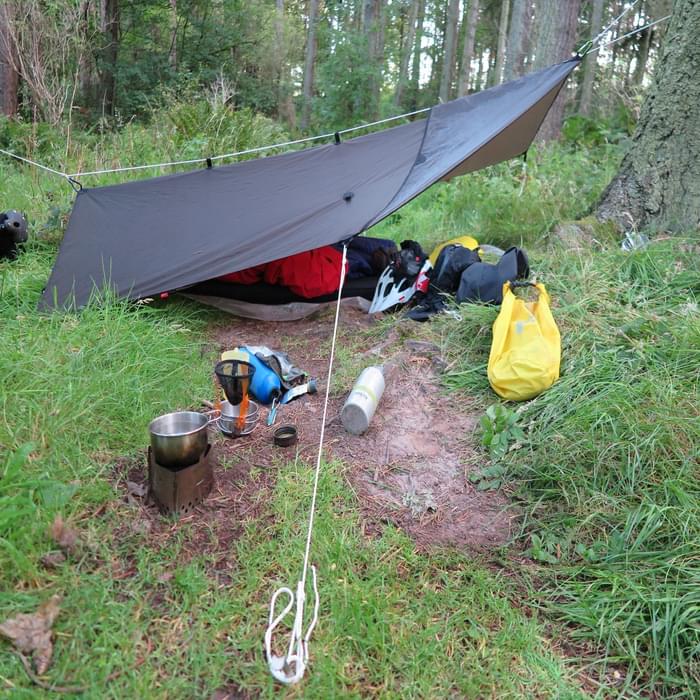 Lightweight tarp, cooking and sleeping arrangement on the Moray Trail