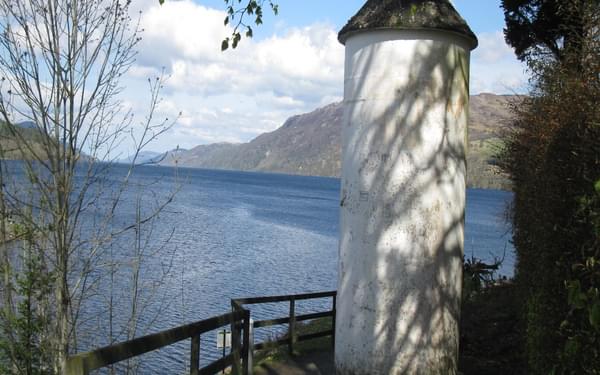 A pepper pot lighthouse on the shore of Loch Ness